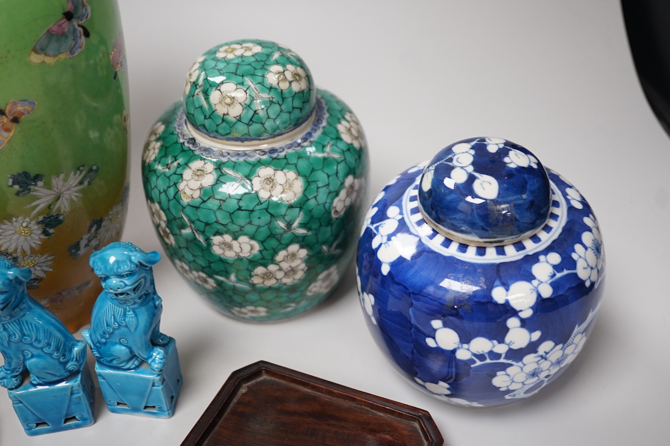 Two Chinese ginger jars, a pair of turquoise lion dogs, a Japanese vase and two similar saucers. Tallest 30cm